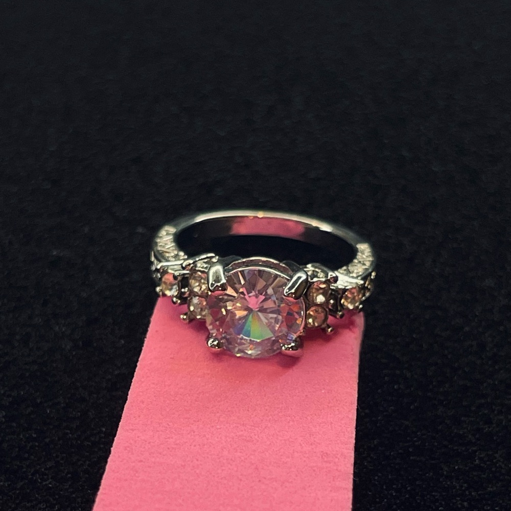 Dazzling Silver Ring with Pink Centerpiece